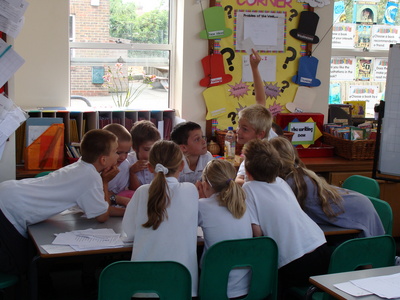 Pupils at Silverdale Primary School enjoying a kanji card game