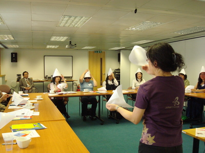 StepOutNet members wearing true and false hats as part of a quiz