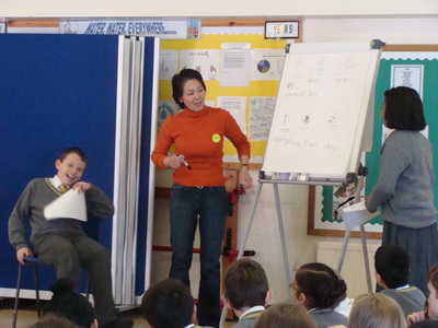 Marina teaching the students Japanese